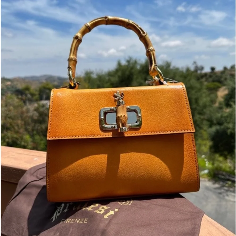 Elegant Yellow Shoulder Bag with Bamboo Handle - Picture 2 of 11